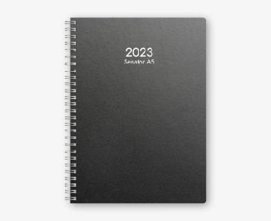 Svart almanacka med spiralrygg