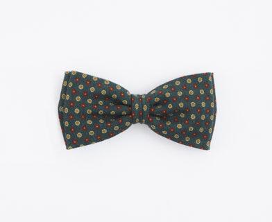 Grön och röd prickig fluga, perfekt för festliga tillfällen.