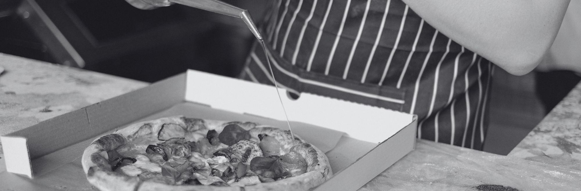 Pizza i en pizzakartong Pizza i en pizzakartong